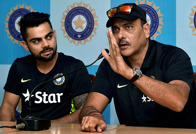 Indian cricket team director Ravi Shastri and captain Virat Kohli interact with the media 