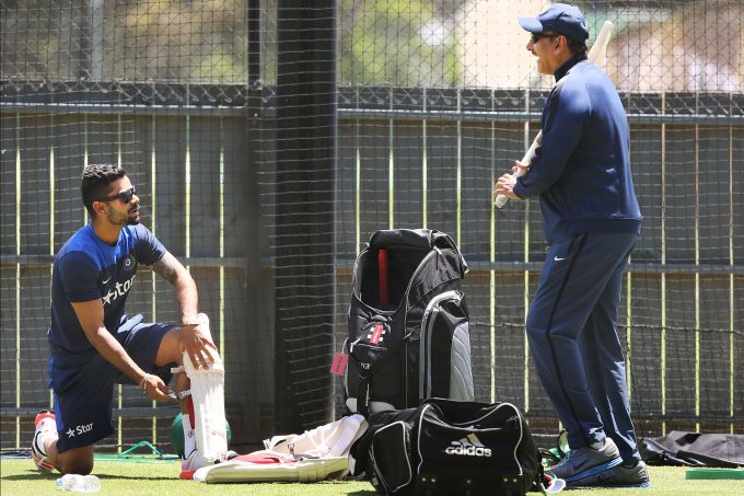 Virat Kohli and Ravi Shastri share a light moment during training 