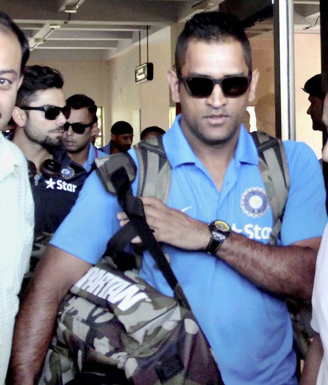 Indian skipper Mahendra Singh Dhoni arrives at Kangra Airport, Gaggal ahead of T20 match against South Africa at Dharmsala