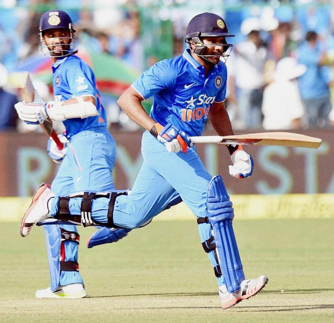 India's Rohit Sharma and Ajinkya Rahane steal a quick run