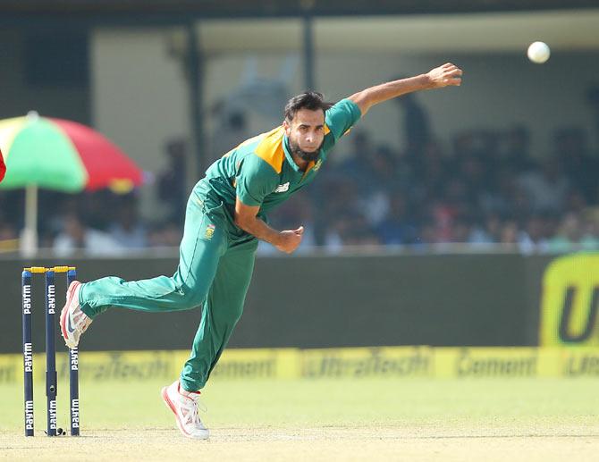 South African leg-spinner Imran Tahir bowls