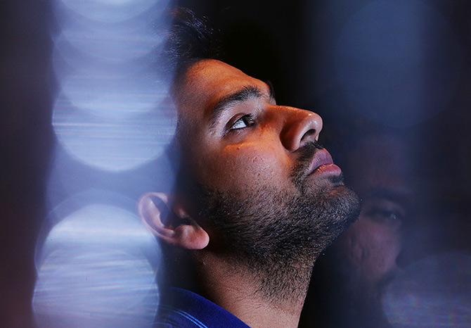 Rohit Sharma looks on during an Indian media session 