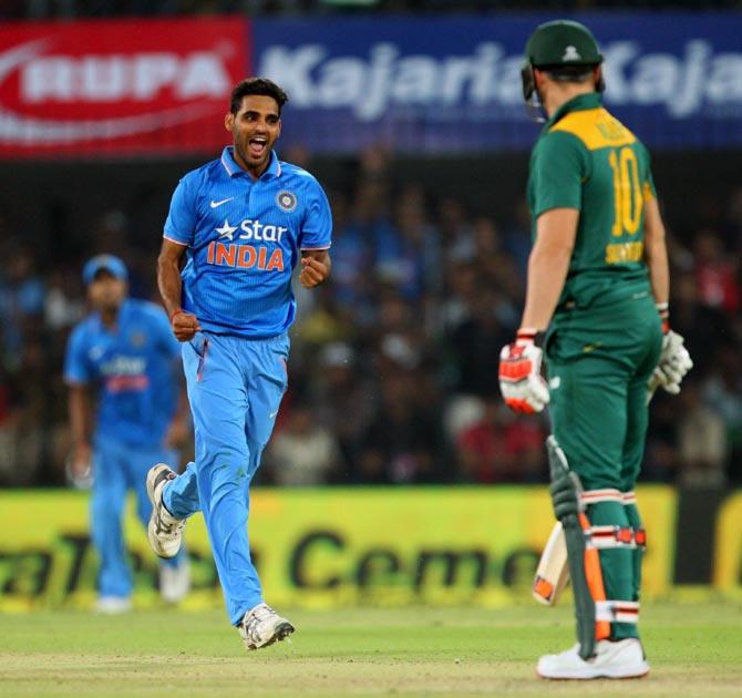  Bhuvneshwar Kumar celebrates the wicket of David Miller