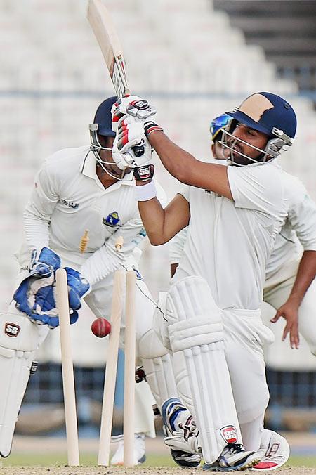 Rajasthan captain Ashok Menaria is bowled out during Ranji Trophy match against Bengal at Eden Garden in Kolkata on Thursday. 