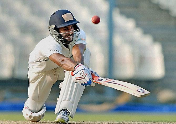 Bengal Captain Manoj Tiwari plays a shot during Ranji Trophy match against Rajasthan at Eden Garden in Kolkata 