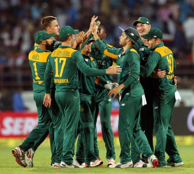 South Africa's players celebrate the wicket of Ajinkya Rahane