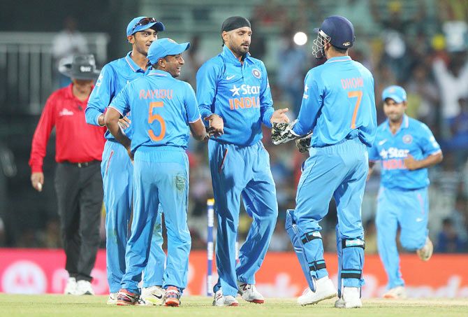 India's Harbhajan Singh celebrates the wicket of South Africa's Quinton de Kock
