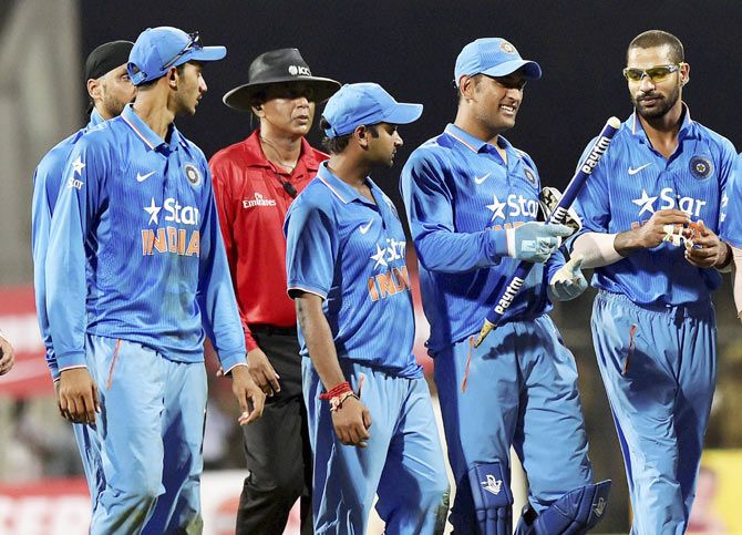 Indian cricket captain Mahendra Singh Dhoni with teammates after winning the fourth ODI against South Africa at M A Chidambaram Stadium, at Chepauk in Chennai on Thursday