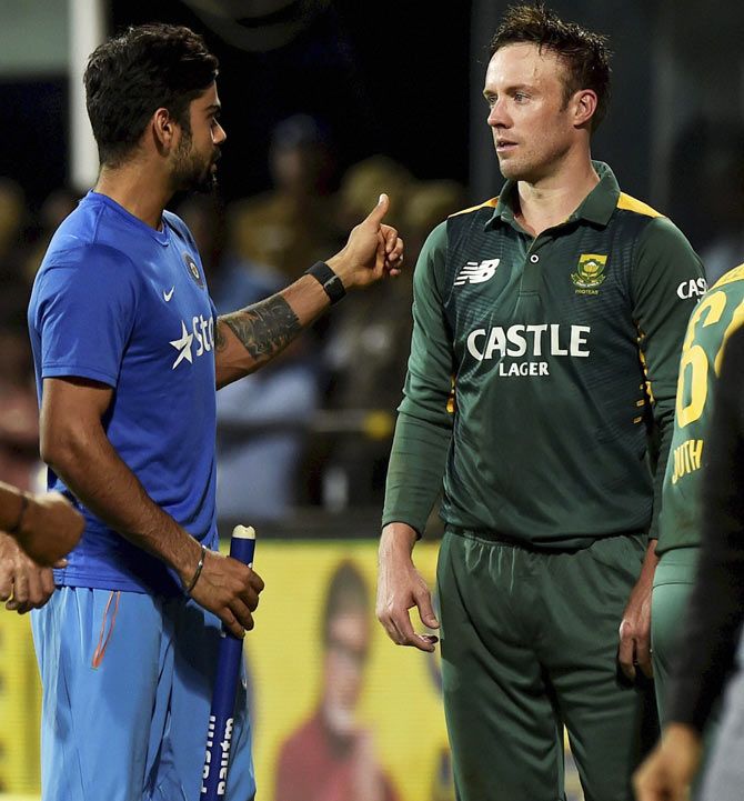 Indian cricketer Virat Kohli speaks to South Africa captain AB de Villiers after winning the fourth ODI on Thursday