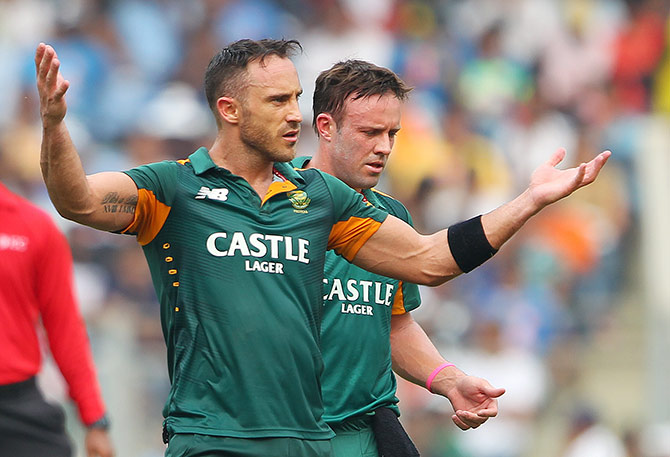 Faf du Plessis of South Africa gestures to the dugout 