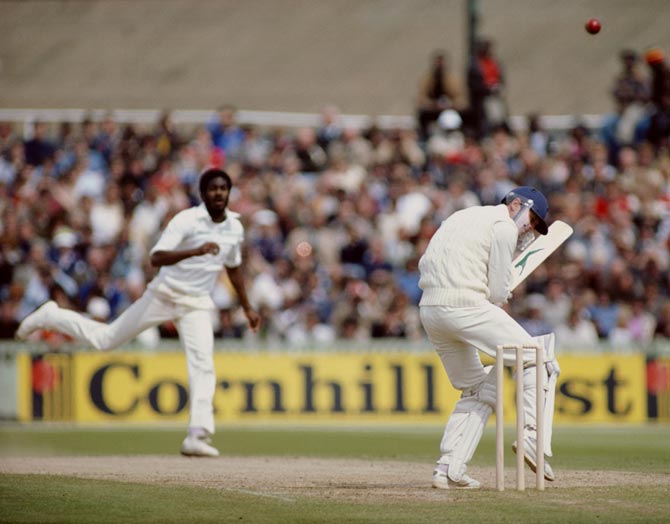 Michael Holding bowls a bouncer to Geoff Boycott