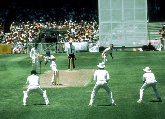 Jeff Thomson bowls a bouncer to Allan Lamb