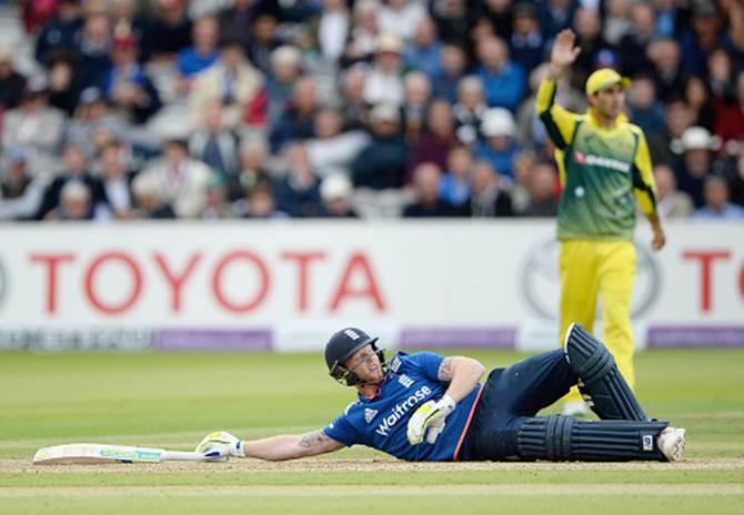 Ben Stokes lies on the ground after avoiding the ball thrown by Australia’s Mitchell Starc