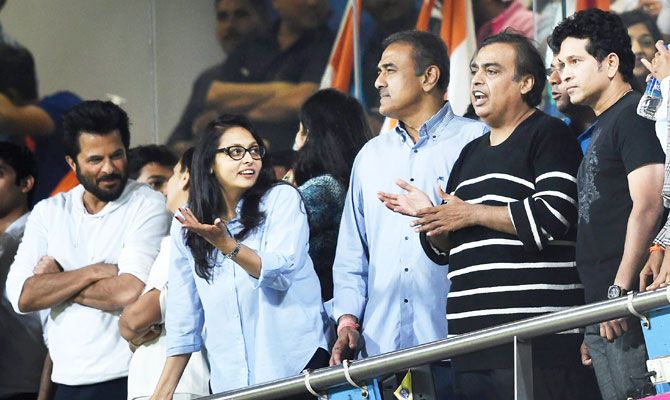 Indian batting maestro Sachin Tendulkar (extreme right) watches the match along with industrialist Mukesh Ambani (2nd from right), politician Praful Patel (3rd from right) and Bollywood star Anil Kapoor (left)