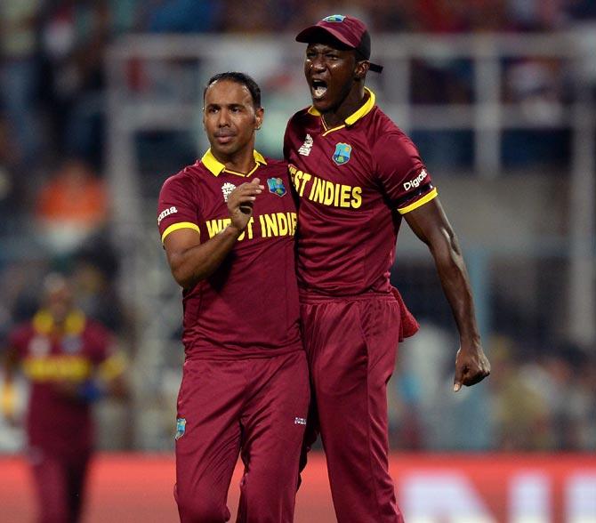 West Indies Captain Darren Sammy with leg-spinner Samuel Badree. Photograph: Getty Images