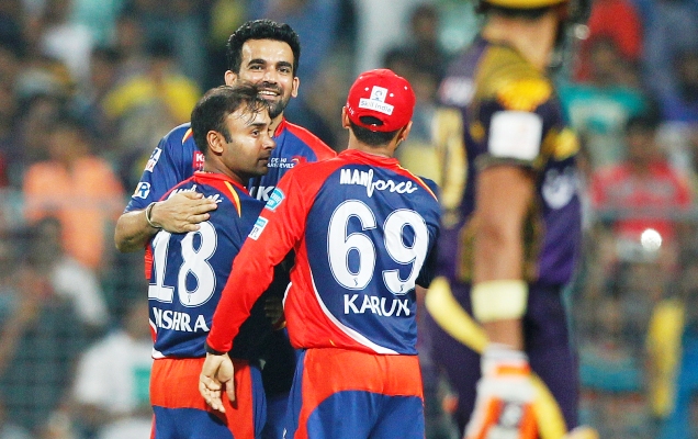 Zaheer Khan, Amit Mishra and Karun Nair celebrate a wicket