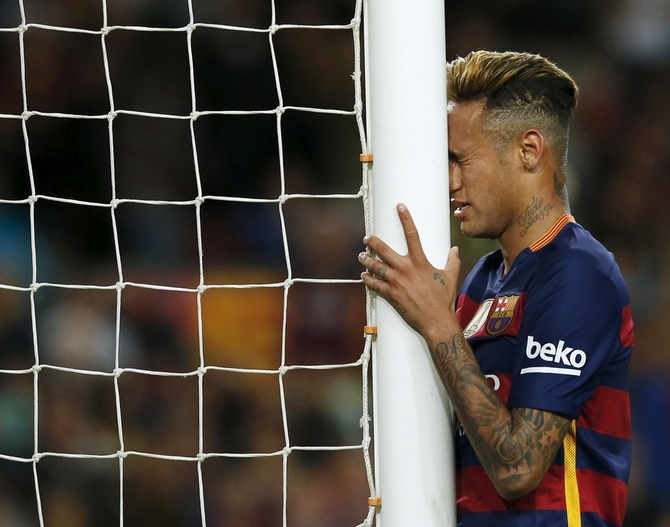 Barcelona's Neymar reacts after missing a goal against Valencia