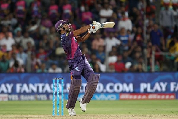 Pune Supergiants captain Mahendra Singh Dhoni goes for heave during his innings against KKR on Sunday