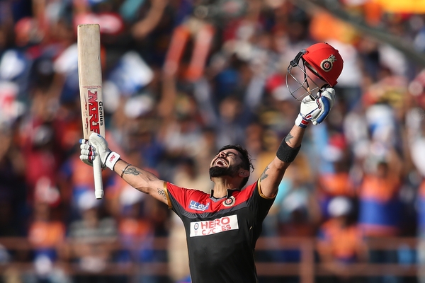 Royal Challengers Bangalore's Virat Kohli celebrates his maiden IPL and T20 century against Gujarat Lions in Rajkot on Sunday