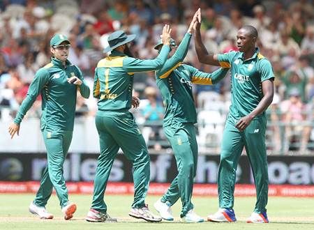 South Africa pacer Kagiso Rabada is congratulated by teammates 