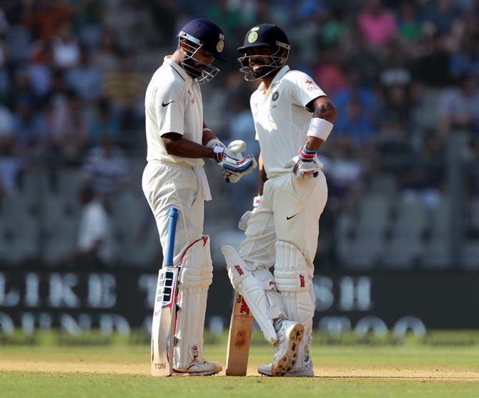 Murali Vijay, left, with Virat Kohli