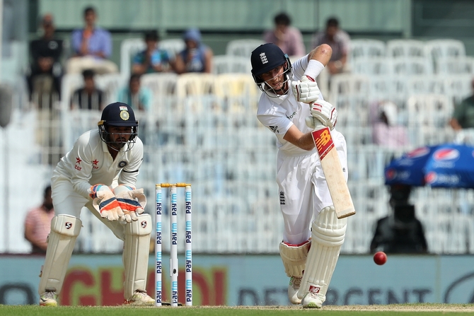 Joe Root plays a straight drive