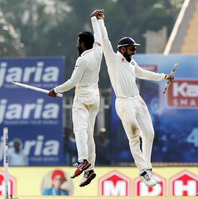 Virat Kohli, right, and Ravindra Jadeja celebrate winning the fifth and final Test in Chennai.