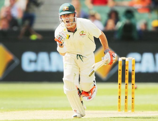 Australia's David Warner celebrates on scoring his century on Day 3 of the Second Test against Pakistan at Melbourne Cricket Ground in Melbourne on Wednesday