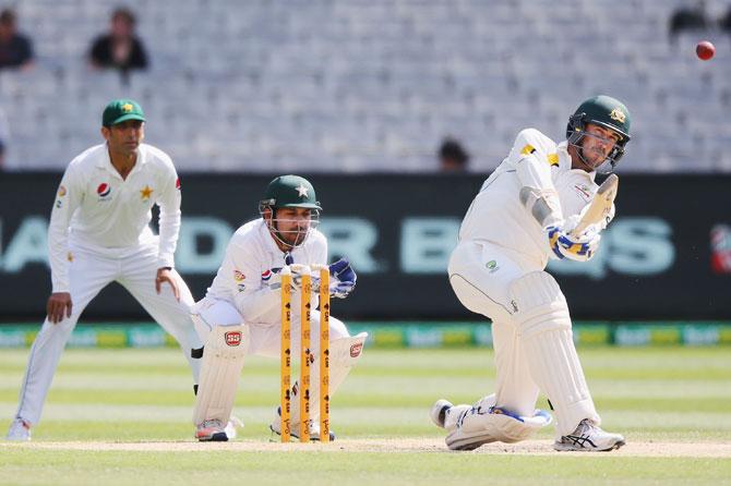 Australia's Mitchell Starc hits a six on Day 5