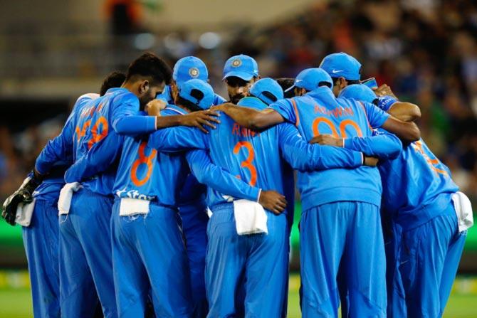 Team India in a huddle