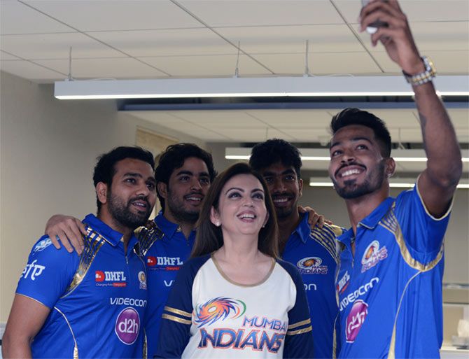 Hardik Patel takes a selfie with Mumbai Indians owners Nita and Anant Ambani, and teammates Rohit Sharma and Jasprit Bumrah.