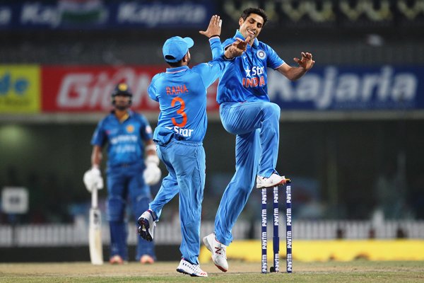 Ashish Nehra of India celebrates a wicket 