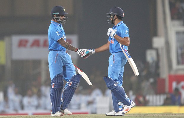 Rohit Sharma of India congratulates Shikhar Dhawan 