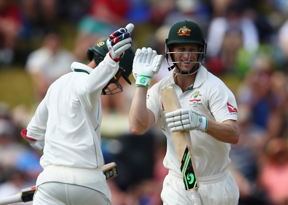 Adam Voges of Australia is congratulated by Nathan Lyon 