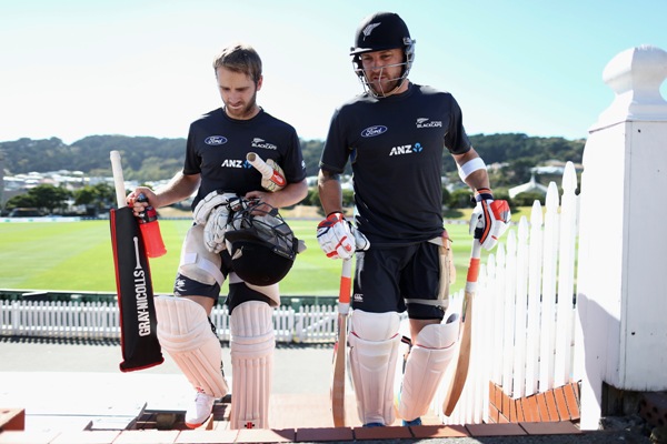 Kane Williamson and Brendon McCullum of New Zealand walk to the nets 