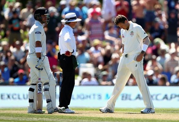 James Pattinson of Australia checks his foot mark 