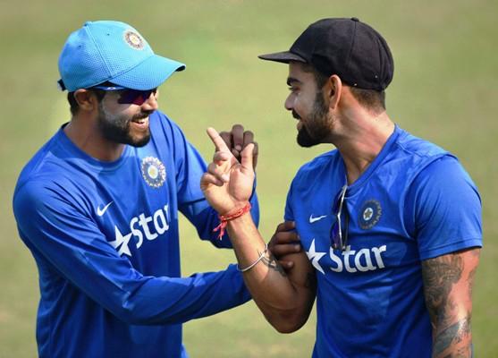 India's Virat Kohli share a light moment with Ravindra Jadeja 