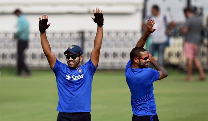 India's Rohit Sharma with Shikhar Dhawan during a practice session 