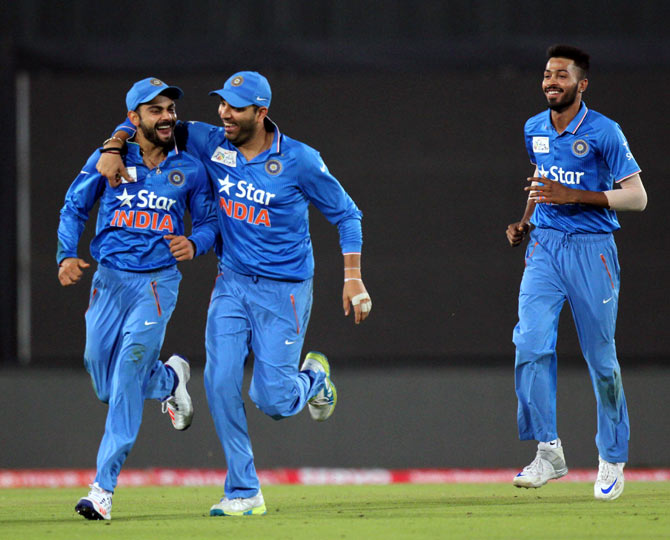  India’s Virat Kohli and Yuvraj Singh celebrate  