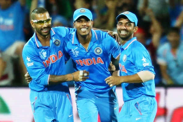 Umesh Yadav (centre) of India celebrates with teammates 