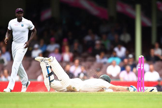 Australia's Joe Burns avoids a run out on Day 5 of the third Test on Thursday