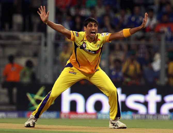 Chennai Super Kings bowler Ashish Nehra appeals successfully for a wicket against Mumbai Indians during an Indian Premier League match