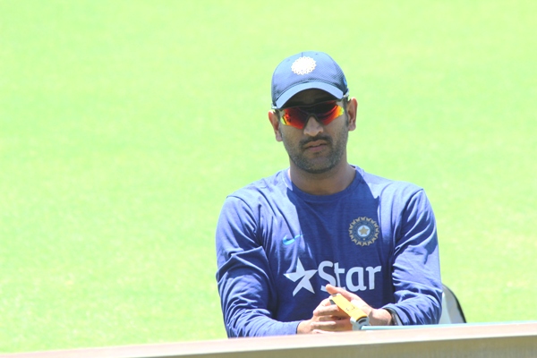 Mahendra Singh Dhoni goes through a fitness drill during the team's training session 