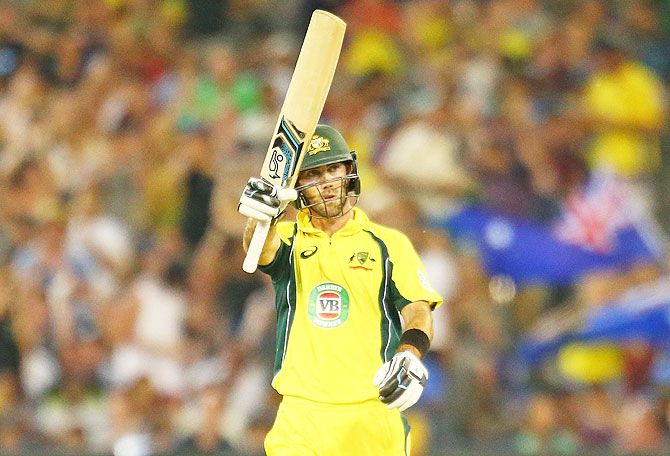Glenn Maxwell of Australia celebrates as he reaches his fifty during the 3rd One-Dayer in Melbourne on Sunday