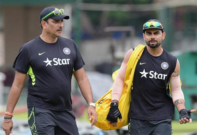 India's Test captain Virat Kohli (right) with Technical director Ravi Shastri 