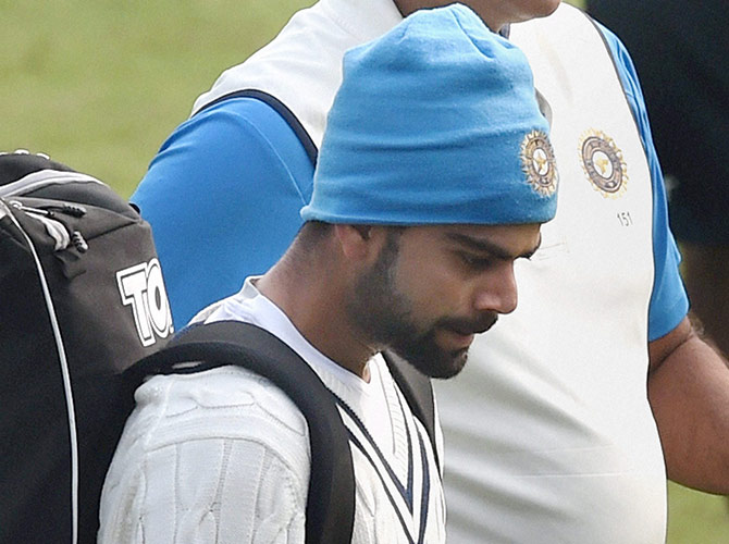 Virat Kohli in a pensive mood during a practice session 