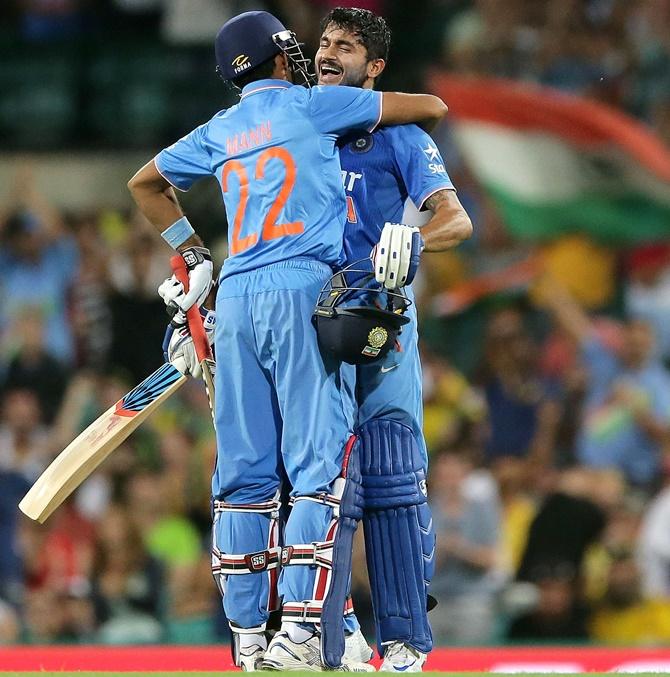 India's Manish Pandey celebrates with Gurkeerat Mann Singh