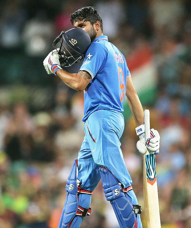 India's Manish Pandey celebrates after scoring a century during the fifth One-Dayer against Australia at Sydney Cricket Ground on Saturday