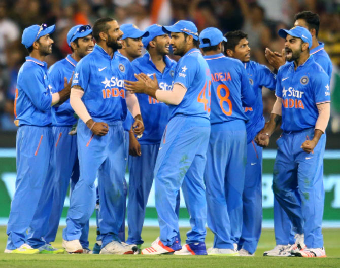 Indian team celebrates a wicket in the ODI series against Australia 