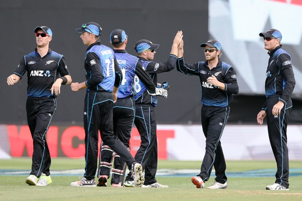 Kane Williamson of New Zealand is congratulated by Tom Latham  